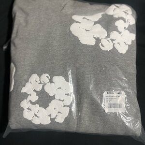 Denim Tears Gray Sweatshirt with White Floral Design